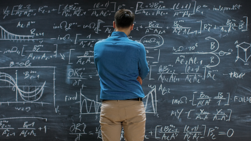 brilliant,young,mathematician,approaches,big,blackboard,and,thinks,about,solving brilliant,young,mathematician,approaches,big,blackboard,and,thinks,about,solving