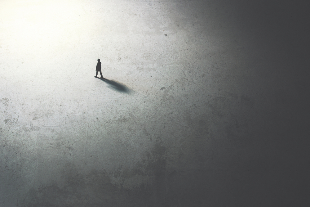 man,walking,in,the,night,toward,the,light